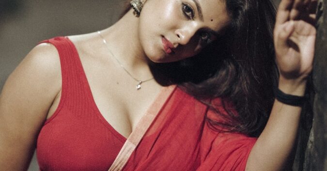 Arpita Hot Pics in Red Sleeveless Deep-Neck Blouse and Saree Celebrity Sarees